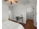 Bright bedroom with hardwood floors, desk, and closet at 3180 Ashton Old Rd, Douglasville, GA 30135