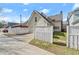 Exterior view of property featuring fenced yard, driveway, and well maintained lawn at 3180 Ashton Old Rd, Douglasville, GA 30135