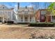 Charming two-story home with a welcoming front porch and manicured landscaping at 3180 Ashton Old Rd, Douglasville, GA 30135