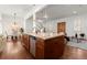 Open concept kitchen with island seating and stainless steel appliances, perfect for entertaining at 3180 Ashton Old Rd, Douglasville, GA 30135