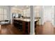 Gorgeous kitchen featuring a large island with seating, stainless steel appliances, and ample counter space at 3180 Ashton Old Rd, Douglasville, GA 30135