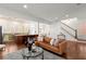 Open-concept living space with hardwood floors and seamless flow to the kitchen at 3180 Ashton Old Rd, Douglasville, GA 30135