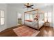 Spacious bedroom with ensuite bathroom access and hardwood floors at 3180 Ashton Old Rd, Douglasville, GA 30135