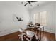 Bright and airy home office featuring a wooden desk, comfortable seating, and natural light at 3180 Ashton Old Rd, Douglasville, GA 30135