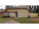 Cozy home with a front yard needing TLC and a fenced-in back yard at 3223 Strawberry Ln, Decatur, GA 30034