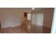 An open-plan living room with sliding glass doors and tiled floors at 3223 Strawberry Ln, Decatur, GA 30034