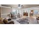 Open basement area with neutral decor, featuring cozy seating and a built-in bar for entertaining guests at 6597 River Island Dr, Buford, GA 30518