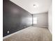 Bedroom with carpeted floors and dark accent wall at 3750 Lake Haven Way, Atlanta, GA 30349