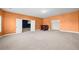 Open bonus room area featuring a small bar and access to another room at 3750 Lake Haven Way, Atlanta, GA 30349