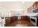 Spacious kitchen with granite countertops and stainless steel appliances at 3750 Lake Haven Way, Atlanta, GA 30349