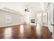 Bright living room with fireplace and hardwood floors at 3750 Lake Haven Way, Atlanta, GA 30349