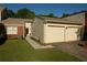 Charming home featuring a two-car garage, brick accents, and a well-maintained lawn at 4631 Calumet Cir, Duluth, GA 30096