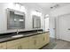 Bright bathroom featuring double sinks, granite countertops, and modern fixtures at 482 Pearl Cove Ct, Atlanta, GA 30350