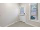 Entryway with a door to the outside, a window, and neutral tile flooring at 482 Pearl Cove Ct, Atlanta, GA 30350