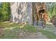 View of the backyard showcasing the multiple patios, siding, and brick exterior at 482 Pearl Cove Ct, Atlanta, GA 30350