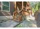 View of the house with a back patio, wooden stairs and walkway at 482 Pearl Cove Ct, Atlanta, GA 30350