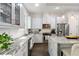 Bright kitchen with granite countertops, stainless steel appliances, and pendant lighting at 482 Pearl Cove Ct, Atlanta, GA 30350