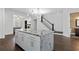 Spacious kitchen with center island, stainless appliances and hardwood floors at 482 Pearl Cove Ct, Atlanta, GA 30350