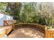 Wooden deck with wooden railings and natural landscape in the background at 1488 Drayton Woods Dr, Tucker, GA 30084