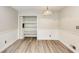 Bright dining area with hardwood floors and built-in shelving, perfect for storage at 1488 Drayton Woods Dr, Tucker, GA 30084