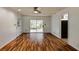 Bright living room with hardwood floors, sliding glass doors and access to outdoor deck at 1488 Drayton Woods Dr, Tucker, GA 30084