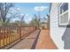 View of backyard deck with natural light and fenced in backyard for added privacy at 1591 Athens Sw Ave, Atlanta, GA 30310