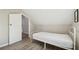 Bedroom featuring sloped ceilings and wood floors at 1591 Athens Sw Ave, Atlanta, GA 30310