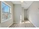 Bright bedroom with a large window and light hardwood flooring at 1591 Athens Sw Ave, Atlanta, GA 30310