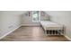 Bedroom featuring sloped ceilings, wood floors and natural light at 1591 Athens Sw Ave, Atlanta, GA 30310