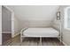 Bedroom featuring sloped ceilings, wood floors and natural light at 1591 Athens Sw Ave, Atlanta, GA 30310