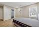 Bright bedroom with wood floors and ensuite bathroom at 1591 Athens Sw Ave, Atlanta, GA 30310