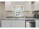 Functional kitchen with granite countertops, stainless steel appliances, and lots of light at 1591 Athens Sw Ave, Atlanta, GA 30310