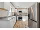 Well-equipped kitchen featuring stainless steel appliances and ample cabinet space at 1591 Athens Sw Ave, Atlanta, GA 30310