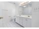 Bathroom featuring double vanity and tiled floors at 2405 Millwater Xing, Dacula, GA 30019