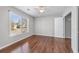Bright bedroom with large window, closet, and ceiling fan at 2405 Millwater Xing, Dacula, GA 30019