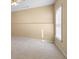 Spacious carpeted bonus room with a large window and a ceiling fan at 2405 Millwater Xing, Dacula, GA 30019