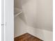 Attic closet with hardwood floors and shelving at 2405 Millwater Xing, Dacula, GA 30019
