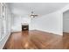 Spacious living room with wood floors, built in shelving and fireplace at 2405 Millwater Xing, Dacula, GA 30019