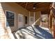 Covered patio with ceiling fan, perfect for outdoor entertaining and relaxation at 2405 Millwater Xing, Dacula, GA 30019