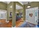 Spacious foyer features hardwood floors and an open layout to the formal dining room at 4162 Crowder Nw Dr, Kennesaw, GA 30152