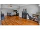 Main bedroom with hardwood floors, dark furniture, and a trey ceiling at 4162 Crowder Nw Dr, Kennesaw, GA 30152