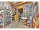 Unfinished basement storage space featuring a variety of shelves filled with assorted household goods and supplies at 4162 Crowder Nw Dr, Kennesaw, GA 30152