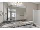 Bathroom featuring double vanity with granite countertop and modern fixtures at 310 Ashigan St, Union City, GA 30291