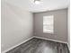 Well-lit bedroom with hardwood floors and a large window at 310 Ashigan St, Union City, GA 30291