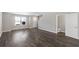 Bright living room boasts hardwood floors and abundant natural light at 310 Ashigan St, Union City, GA 30291