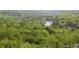 A distant aerial view of rolling hills with plentiful trees at 3300 Windy Ridge Se Pkwy # 1309, Atlanta, GA 30339