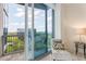 Balcony with city views, lounge chair, and decorative pillows at 3300 Windy Ridge Se Pkwy # 1309, Atlanta, GA 30339