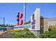 Entrance sign for Truist Park, with colorful landscaping and a clear blue sky backdrop at 3300 Windy Ridge Se Pkwy # 1309, Atlanta, GA 30339