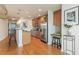 Stylish kitchen with stainless steel appliances, wood cabinets, and hardwood floors at 3300 Windy Ridge Se Pkwy # 1309, Atlanta, GA 30339