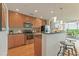 Well-lit kitchen with stainless steel appliances and breakfast bar seating at 3300 Windy Ridge Se Pkwy # 1309, Atlanta, GA 30339